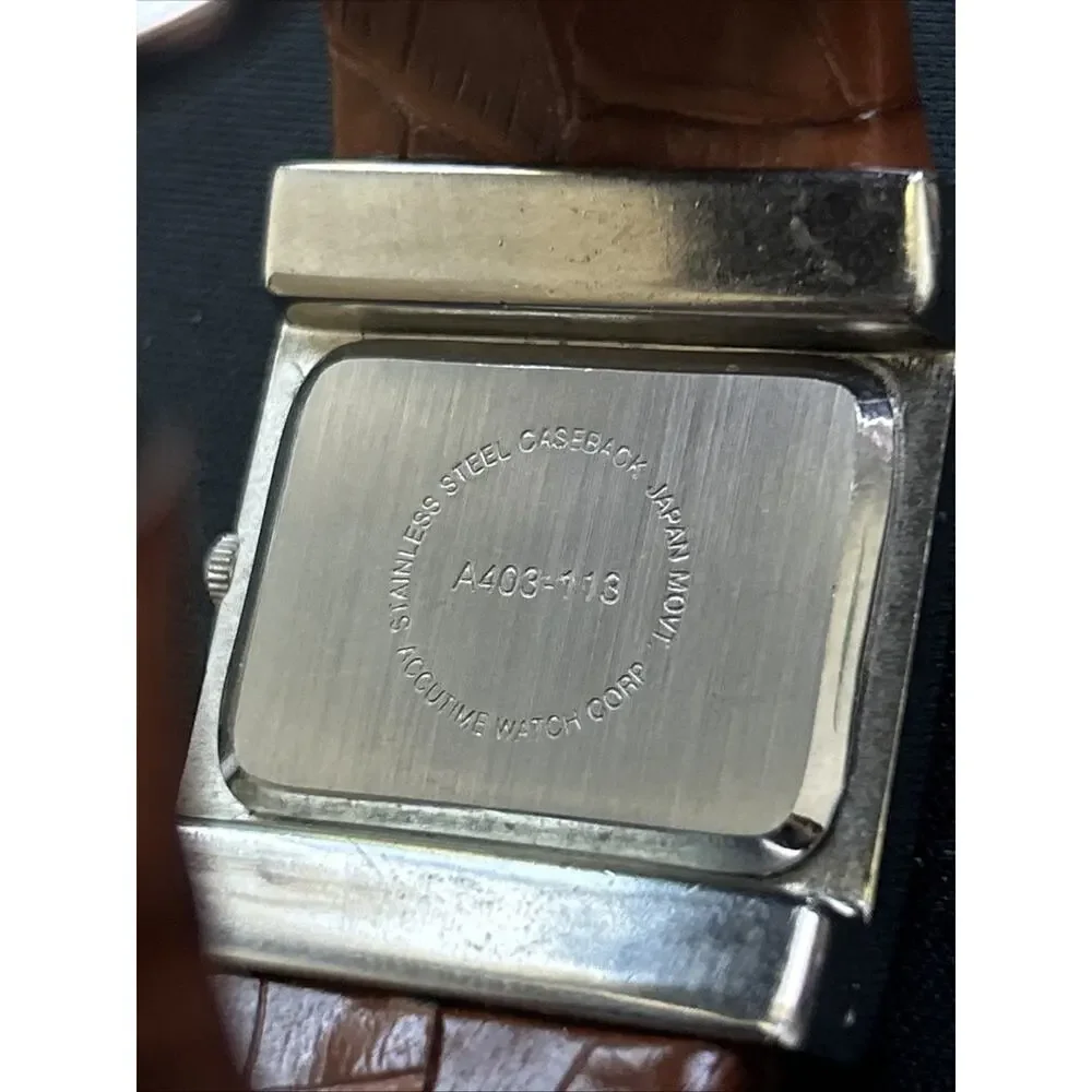 Silver Case White Dial Brown Band Women’s Cuff Watch